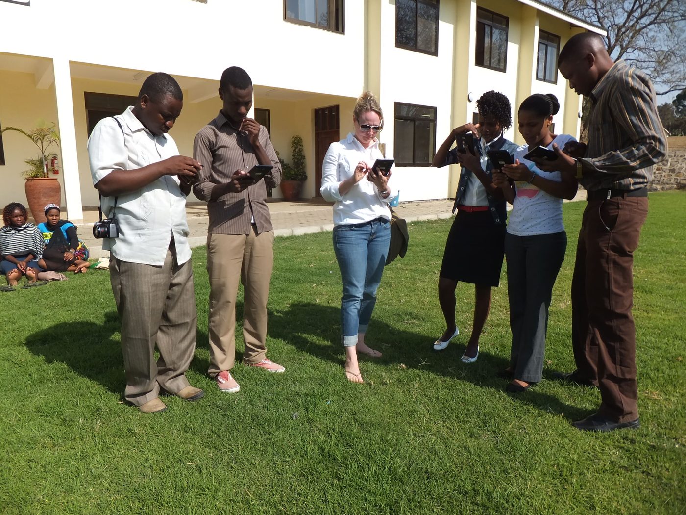 UPC staff and enumerators during a data collection training session in Arusha